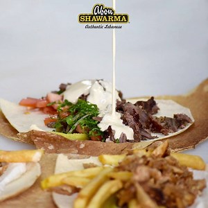 14K views · 40 reactions | “Easy on the sauce” - Said no one ever. | Abou Shawarma | Facebook