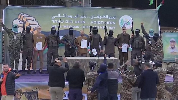 Moment Hamas parades Israeli hostages on stage in latest exchange