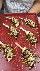 12K views · 157 reactions | This banana dessert changed my life I will show you how to make an easy no bake banana dessert . Youll need: banana , caremel, hot fudge, peanuts, peanut butter, sticks Enjoy! | Windy M | Facebook