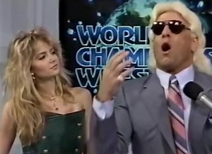 On March 26, 1988 NWA World Championship Wrestling aired on the SuperStation TBS. After hearing from NWA board member Rob Garner, Tony Schiavone gets a word with NWA World Heavyweight Champion Ric Flair who is accompanied by 1988 “Penthouse Pet of the Year” Patty Mullen. | Davenport Sports Network
