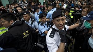Hong Kong women protest jail time for a “breast assault” with photos of their weapons
