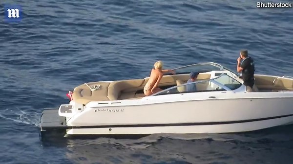 Elizabeth Debicki is captured in a boat during The Crown new season filming