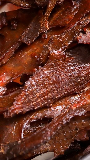 Thanksgiving Turkey Jerky 🦃 The only dry turkey we're on board with, this jerky is made with canned cranberry sauce, sage and our Original Jerky kit. 5 LB – Turkey Breast Jerky Kit – Original Recipe ½ Cup – Cranberry Sauce ½ tsp – Sage, rubbed 1. Trim the turkey as needed and then slice into 3/8” thick slices against the grain. 2. Combine one packet of jerky seasoning and one packet of cure from the jerky kit in a bowl. Add in the cranberry sauce and rubbed sage. Stir until well combined. 3. Ad