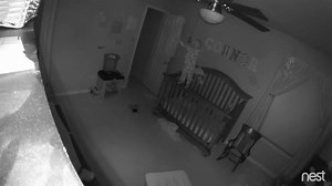 Nanny-Cam Footage of “Possessed Baby”!!! -------------------------------------------------------- Date: April 12, 2016 -------------------------- Parents Chuck and Kate Booth were shocked when they saw this nanny-cam footage of their son Connor scaling his crib in the middle of the night. Screaming in terror, Connor stands up, holding the rail of his crib… and then apparently climbs onto the rail to stand upright on it, balancing precariously on the narrow edge. Then it seems as if something inv