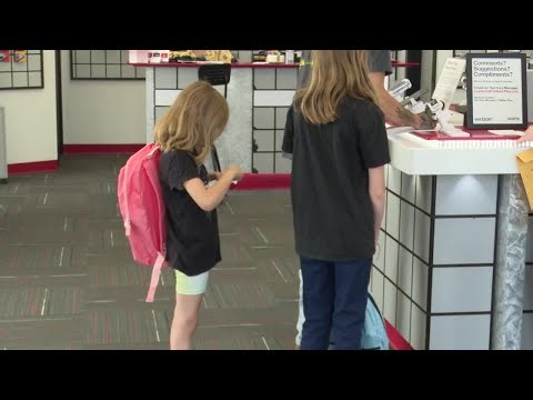 Cellular Plus gives away hundreds of free backpacks