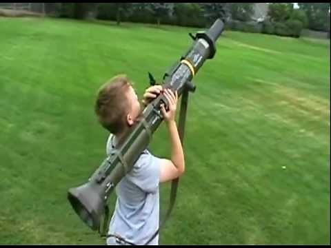 Kid with AIRSOFT M136 Rocket Launcher