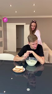 Man absorbed in phone ignores mischievous woman; humorous scenario. | Fabiosa Daily