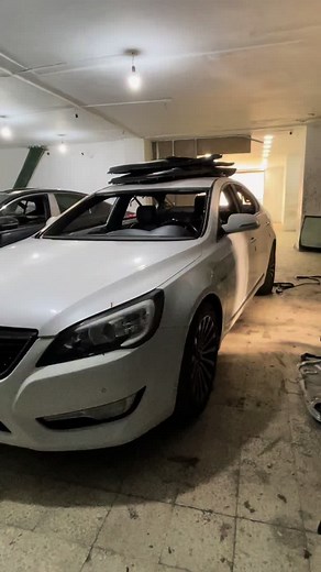 Kia Car Repair Process in Garage Setup