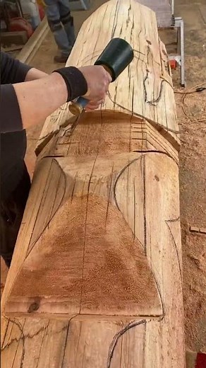 The stages of carving out a totem pole