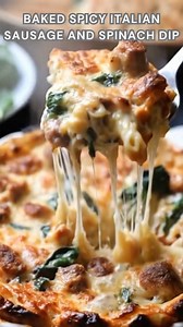 9.1K views · 58 reactions | Sausage browned hot. Stir in garlic, Italian seasoning, fire-roasted tomatoes. Fold in spinach, cream cheese, mozzarella. Bake at 375°F for 20 minutes until bubbling and golden. Spicy, cheesy, and irresistibly creamy your new crowd-favorite dip. Ingredients ➤ 2 tbsp olive oil ➤ 1 small yellow onion, diced ➤ 1 tsp kosher salt ➤ 1 lb ground spicy Italian sausage FULLL Recipe in First Cօʍʍеոτ  | Nessy Recipes | Facebook