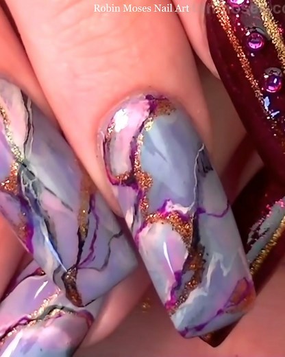 Who's ready for some fun and creative nail art?? This design takes it to the next level!! 💅 #robinmosesnailart #divanails #nailartbrushes #marblenails #nailartlovers #springnails #creativenails #nailvideos | Robin Moses Nail Art