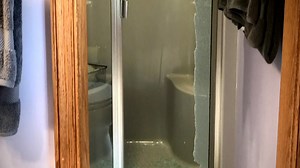 The dangers of exploding glass shower doors