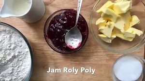 Growing up, Jam Roly Poly was one of my favourite puddings after our Sunday roast. This is the same, warm jammy deliciousness - but without the suet. Perfect for winter, served straight from the oven with custard. | One Handed Baker