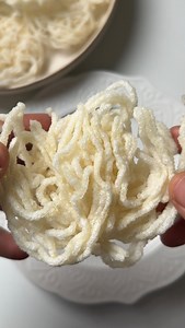 Homemade sandige! Summer at home means one thing: a big batch of sandige, hopefully enough to last the whole year😅 Took some time, but totally worth it! Fry them up and crunch away!✨ 📝Ingredients: • 1 cup rice • ¼ cup water (for blending) • 2 ¾ cups water (for cooking) • Salt – to taste • A pinch of hing (asafoetida) • Butter paper / flat surface for spreading ⸻ Method: 1. Soak 1 cup of rice in enough water for at least 6 hours. 2. Drain and blend the soaked rice with ¼ cup water until super s