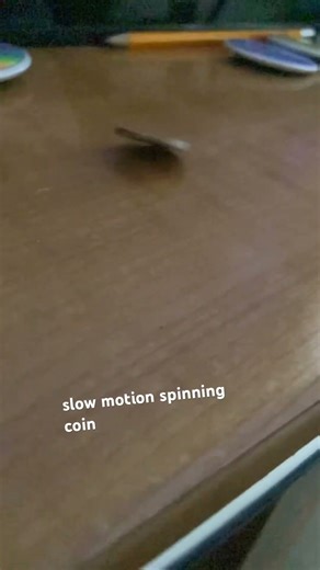 slow motion spinning coin