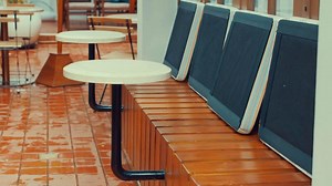 Modern Outdoor Seating with Wall-Mounted Tables