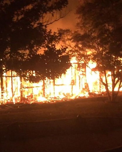 Fast-moving wildfire slams Northern California