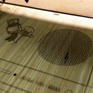 Andre pulls a custom Xbox 1s bamboo cover fresh off the laser #xbox #xbox1s #xboxskin #woodcase #lasercut | Toast