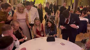 In this video, I add a personal touch to card magic by having a chosen card signed, making it uniquely representative of the spectator. The magic unfolds at a wedding, seamlessly entertaining guests during moments while the band setup, injecting a touch of amazement into the celebrations! Video credit the lovely Bismark Wedding Photography | Gerard Kearney The Magician