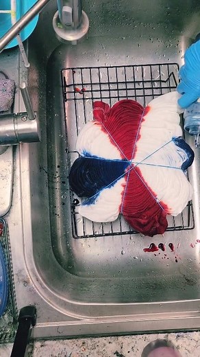A traditional RWB July 4th dye #spiral #TieDye #tyedye #tiedyeshirt #4thofjulyoutfit #redwhiteandblue #handdyed #tiedyefashion | Habitual Dyer