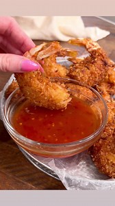 Coconut Shrimp with Sweet Chili Sauce is one of my favorite appetizers. These are incredibly easy to make and so good! Recipe➡️➡️ https://thesaltycooker.com/coconut-shrimp-with-sweet-chili-sauce/ #coconutshrimp #shrimprecipe #coconutshrimprecipe #seafood #sweetchilisauce #appetizer #easyappetizer #easycoconutshrimp | The Salty Cooker