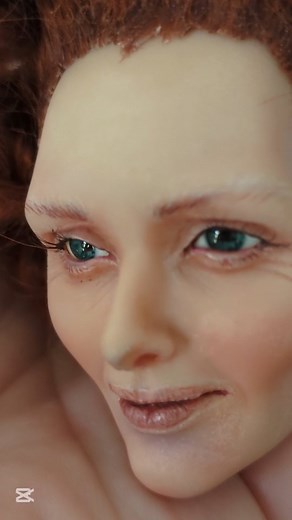 Orlando (movie 1992) inspired wig for a customer. This is for Tilda Swinton's character as a male courtier to Queen Elizabeth I. The hard cap wig is rusty red goat wool and heat curled meticulously by hand. The doll is also named Orlando and inspired by the same book / film. I gave the head a gender neutral no makeup style faceup that can be boyish with the right wig. #emiliacouture #inamoratadoll #artdoll #beautyindiversity #nonbinary #genderfluid #diversity #bjd #doll #customdoll #ooakdoll #ha