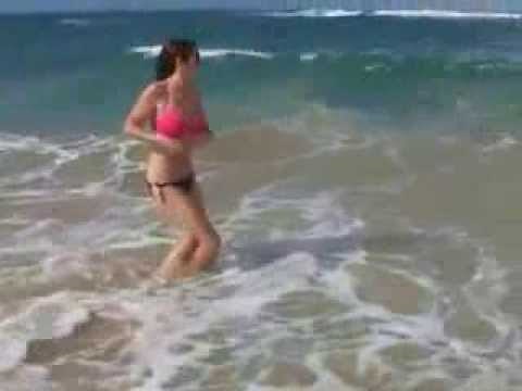 Girl loses bikini bottoms at beach!