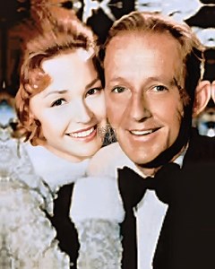 "Bing Crosby and his wife, Kathryn Grant, are photographed beside their ornately decorated Christmas tree in late 1977, during promotional efforts for Bing Crosby’s Merrie Olde Christmas, a televised holiday special filmed partly in London and aired posthumously on November 30th that year." #fblifestyle | History Through Time