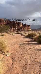 Solomon's Pillars are natural red sandstone formations in Timna Park in southern Israel, created by millions of years of erosion. They're named after King Solomon due to legends connecting him to ancient copper mining in the area, though they're entirely natural geological structures. The site is now a popular tourist attraction with hiking trails and climbing routes. | Nili Israel Photos
