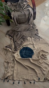 A modal silk saree with hand block Ajrakh print and Zari weave sounds absolutely exquisite! Ajrakh prints are known for their intricate patterns and vibrant colors, and the addition of Zari weave adds a touch of elegance to the saree. It would make for a beautiful and timeless piece of clothing Modal silk sarees are known for their softness, sheen, and luxurious feel. These sarees are made from a blend of modal, a type of rayon, and silk fibers. The result is a fabric that combines the smoothnes