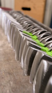 Sharp edges all around! This is a fresh batch of 2.25LB Camp Axes in process of getting hand sharpened. Hoffmanblacksmithing.com #hoffmanblacksmithing #hoffmanblacksmithingaxes #hoffmanblacksmithingcampaxes #sharpsaturday #sharpedges #axeheads #handforgedaxes #premiumaxes #americanmadeaxes #americanmadetools #madeinusa #forgedinusa #handforged #flyby | Hoffman Blacksmithing