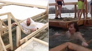 Russians take a dip in freezing water to mark Epiphany