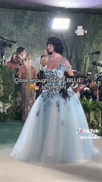 Elegant Light Blue Ball Gown at Formal Event