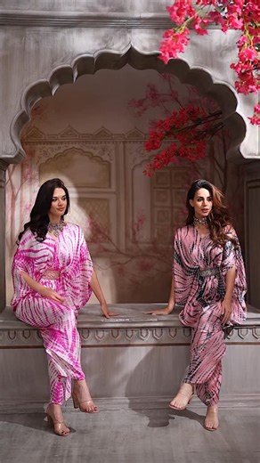 The Arab Crab on Instagram: "Pink Tie-Dye Draped jumpsuit with Belt A playful twist on tradition, our pink tie-dye jumpsuit with an embellished belt adds flair and shape to your look. Whether you’re heading to a festive gathering or a summer soirée, this breezy silhouette and boho vibe promise effortless elegance."