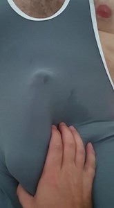 Showing in Lycra wrestling singlet