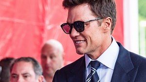 Tom Brady spotted handing out burgers at Boston Logan Airport