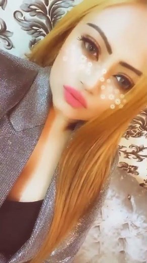 Hot Busty Babe Showing Huge Cleavage