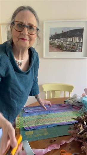 Replenishing the plants in my tubs with Summer bedding I wracked my brains to work out what to do with the old Christmas wreath. Rather than start from scratch or use dried or faux flowers, I have tied bows of fabric to brighten up the door! | Art in Textiles