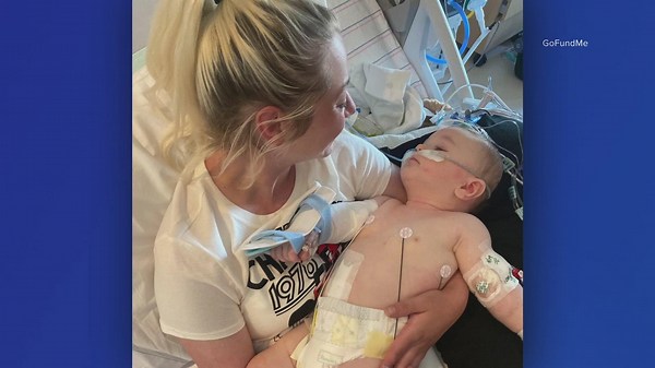 'He's alive. He's doing good. We love him.': Grandfather says baby shot multiple times in hostage situation is awake, rubbing eyes