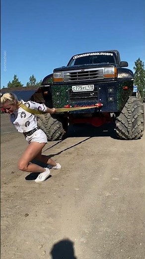 GIRL PULLS A HUGE CAR