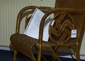 Nazi swastika chair and nude paintings owned by Hitler auctioned in Germany