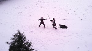 Cosplayer in Image of Geralt from the Game or Film the Witcher Fights by Swords with Enemy in Snowy Forest. Stock Video - Video of killer, male: 172636973