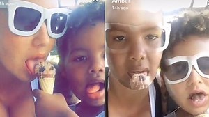 Amber Rose flaunts her toned pins in a striking polkadot minidress