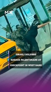 Video footage shows Israeli soldiers stopping a car at a checkpoint in Jericho, West Bank. In the footage, an Israeli soldier is seen dragging a Palestinian man by his shirt to the side, while another is pushed into the vehicle. The search proceeds as the soldier kicks the man's legs away and presses his hands against a wall. | Middle East Eye