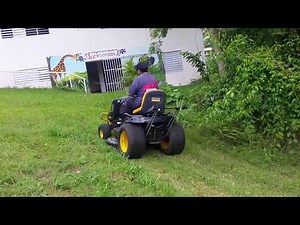 Young lady and her Craftsman Pro PYT 9000 must see the right way to cut grass