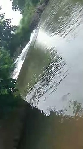 Surplus weir with water flowing......