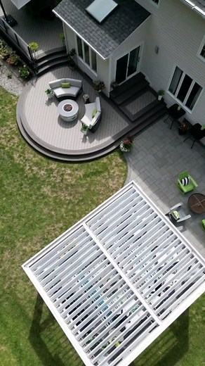 Curves are SO SEXY ! This multi-level cicular deck is so hot.. it even has curved treads on the stair case! Cascading from the higher level down to open up completely to the yard was the plan. Our custom stainless steel cable rail helps with the open feeling the clients wanted. The louvered roof gives them a relaxation destination in this great backyard. It's time to GET your yard READY for 2024 NJ NY CT 973.729.2125 . . . #outdoorlivingspace #covereddeck #deckdesign #outdoorfireplace #curveddec