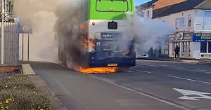 Video shows bus burst into flames on major city road