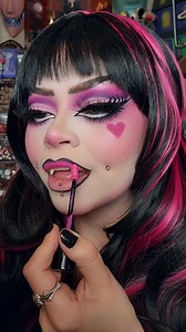 Freaky just got fabulous 💀💕 Draculaura from Monster High makeup tutorial 🦇 Follow me on all socials @sydneynicoleaddams 💖 • 💕 Costume @uwowo.cosplay 💕 Fangs & wig @spirithalloween • Cut & styled by me • ✨️ @rarebeauty Brow Harmony Pencil in Cool Brown, Brow Gel, Bronzer Stick in Happy Sol & Liquid Blush in Lucky ✨️ @plouise_makeup_academy 0.5 Base • Discount code "sydneynicole10" 💖 ✨️ @urbandecaycosmetics 24/7 Liquid Liner in Whiskey ✨️ @spoiledlipscosmetics RIP Palette & Crybaby Eyeliner
