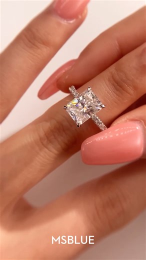 73 reactions · 7 comments | Dazzling in Emerald! ✨ Admire the intricate details of our stunning emerald-cut engagement ring. From its elegant setting to its mesmerizing sparkle, every facet tells a story of love and commitment.  Link in bio to check out more details. #MSBLUE #MSBLUEjewelry #MSBLUErings #springsales #springwedding #emeraldjewellery #proposal #ForHerWorld | MsblueJewelry | Facebook